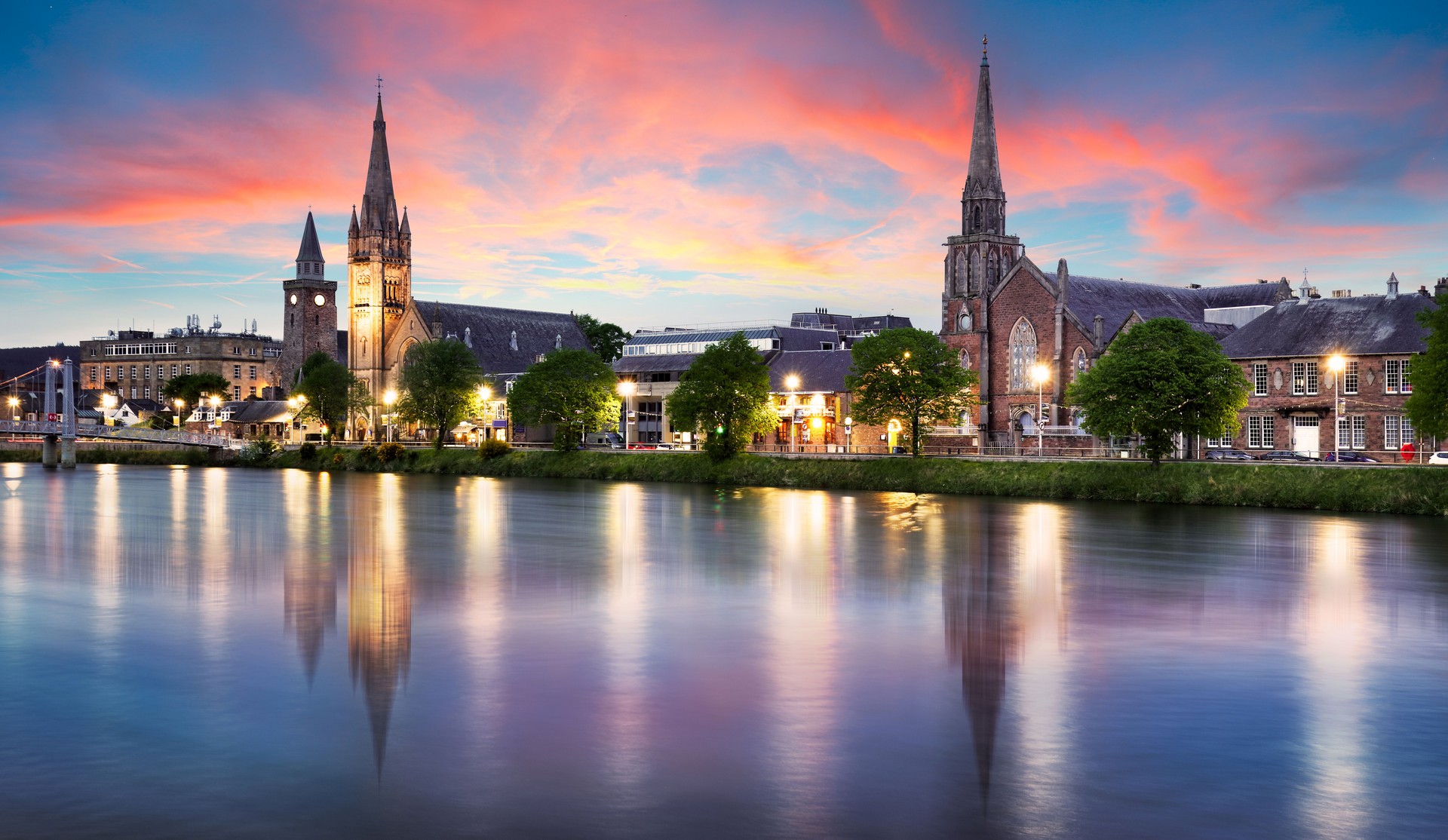 The view of the churches of Inverness on the Ness River, experienced by cruise passengers on a Spirit Journeys shore excursion